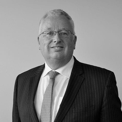 jon round PRIMIS group financial services director in black and white